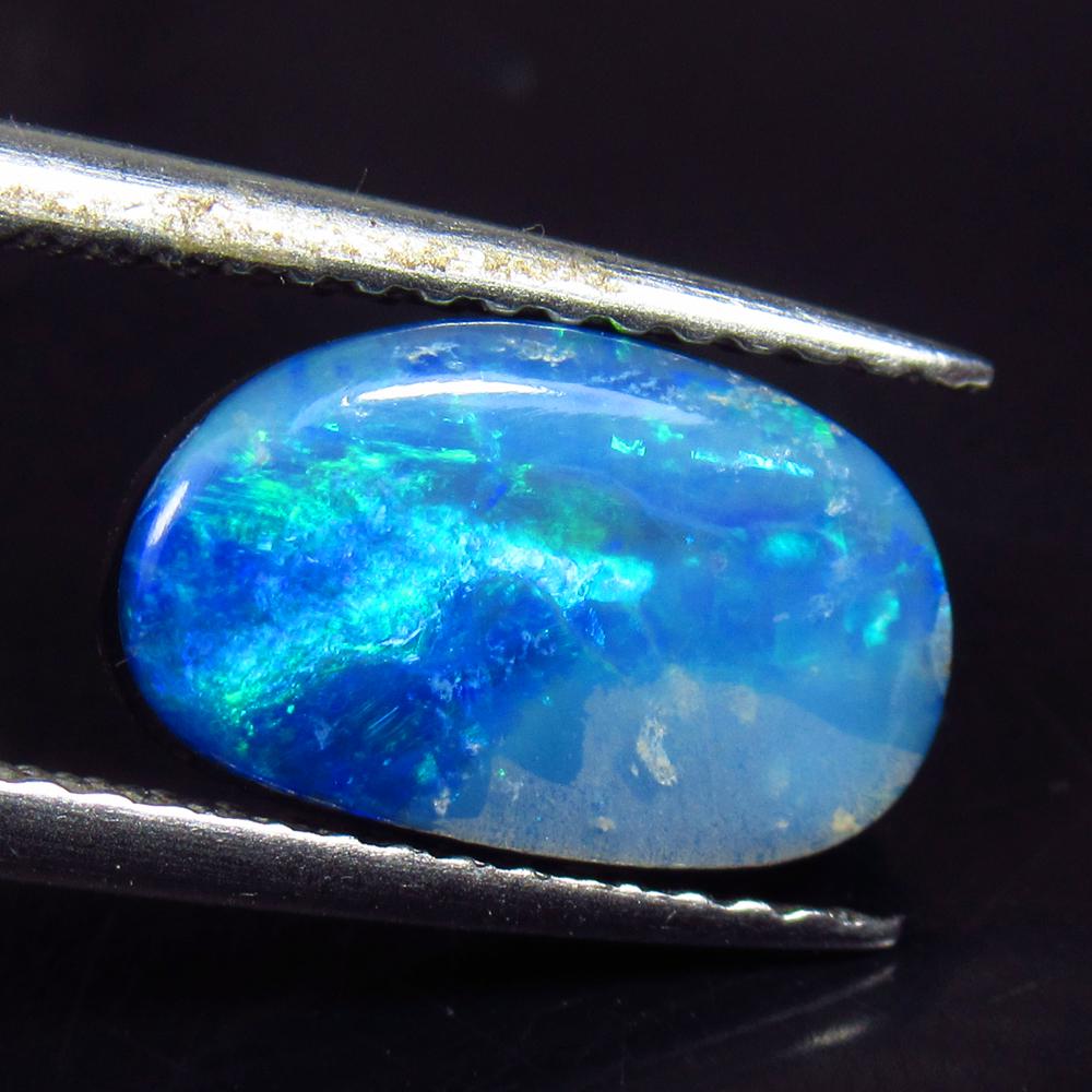 2.79 Ctw Natural Australian Doublet Opal Oval Cabochon: No Reserve! Title: 2.79 Ctw Natural Australian Doublet Opal Oval Cabochon Stone Clarity: Opaque Gemstones: Natural Australian Opal Carat Weights: 2.79 Size/Dimensions: 11.10 x 6.80 x 3.60 mm Additiona