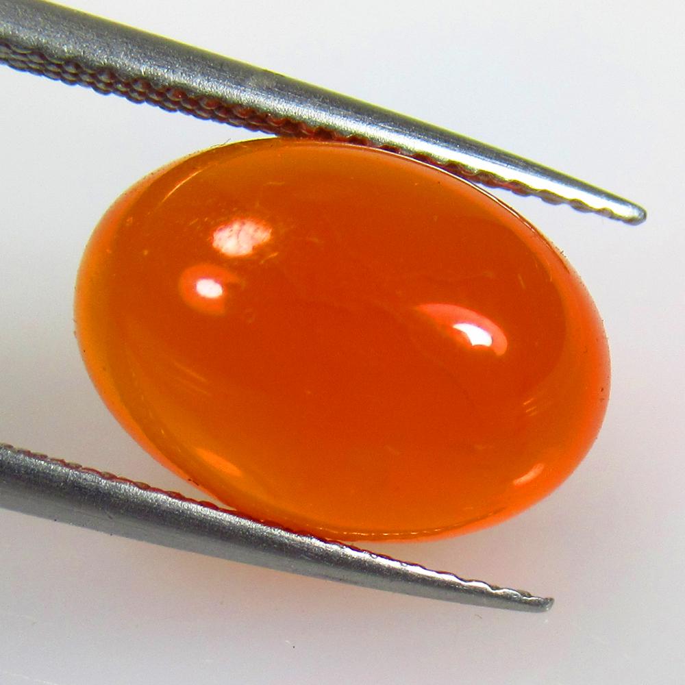 6.07 Ctw Natural Orange Carnelian Oval Cab: No Reserve! Title: 6.07 Ctw Natural Orange Carnelian Oval Cab Stone Clarity: Semi-Transparent Gemstones: Carnelian Carat Weights: 6.07 Size/Dimensions: 13.90 x 9.80 x 6.00 mm Additional Information: E