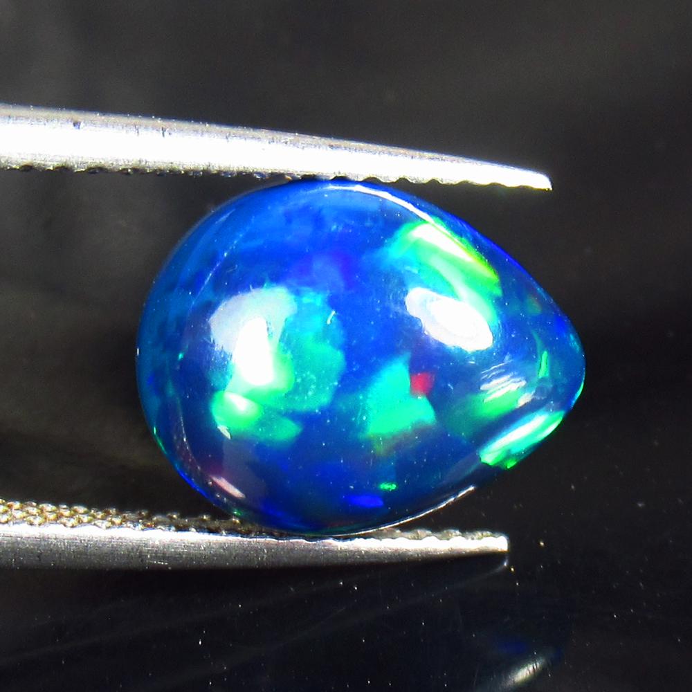 2.68 Ctw Natural Black Fire Opal Pear Cabochon: No Reserve! Title: 2.68 Ctw Natural Black Fire Opal Pear Cabochon Stone Clarity: Opaque Gemstones: Natural Opal Carat Weights: 2.68 Size/Dimensions: 12.00 x 9.60 x 5.50 mm Additional Information: Shap