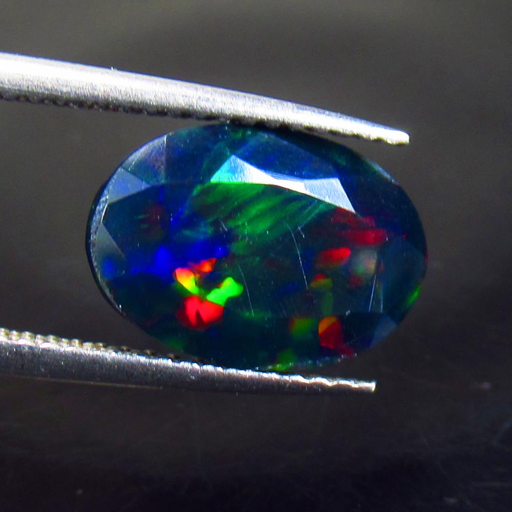 2.33 Ctw Natural Black Fire Opal Oval Cut (1 of 3)