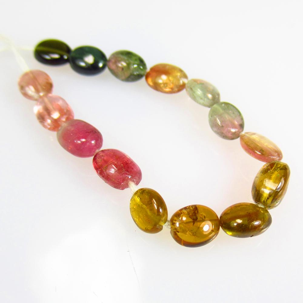 11.03 Ctw Natural 15 Drilled Multicolor Tourmaline Dumble Beads: No Reserve! Title: 11.03 Ctw Natural 15 Drilled Multicolor Tourmaline Dumble Beads Stone Clarity: Semi-Transparent Gemstones: Tourmaline Beads Carat Weights: 11.03 Size/Dimensions: 5.6x4.8 to 6.6x4.7 