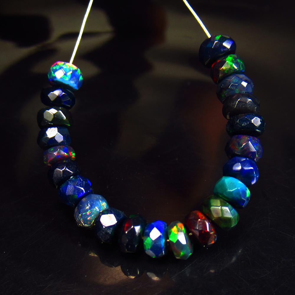 5.22 Ctw Natural 22 Drilled Faceted Black Opal Beads: No Reserve! Title: 5.22 Ctw Natural 22 Drilled Faceted Black Opal Beads Stone Clarity: Translucent Gemstones: Faceted Black Opal Beads Carat Weights: 5.22 Size/Dimensions: 4.30 to 4.60 mm / 22 PC's Ad