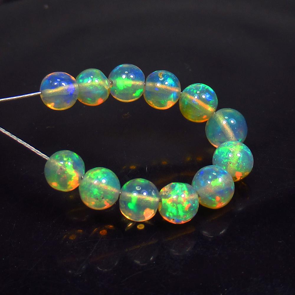 3.73 Ctw Natural 12 Multi-Color Fire Opal Ball Beads (1 of 2)