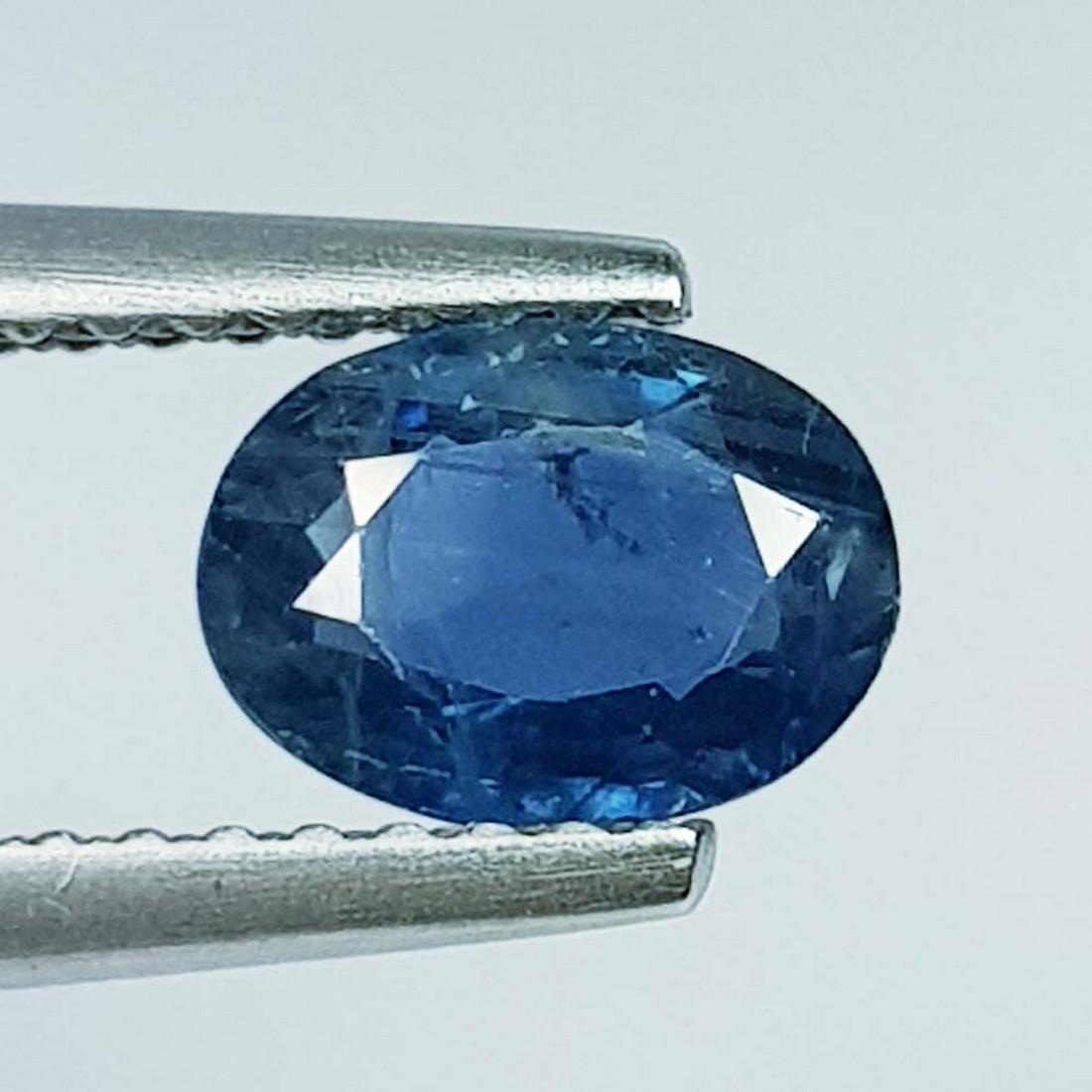 0.90 ct Natural Blue Sapphire: No Reserve! Title: 0.90 ct Natural Blue Sapphire Color/Clarity: Loosegemstone Gemstones: VS Carat Weights: 0.9 Size/Dimensions: 7.00 x 5.20 x 2.60 Additional Info: Oval - Burma Shipping: Domestic