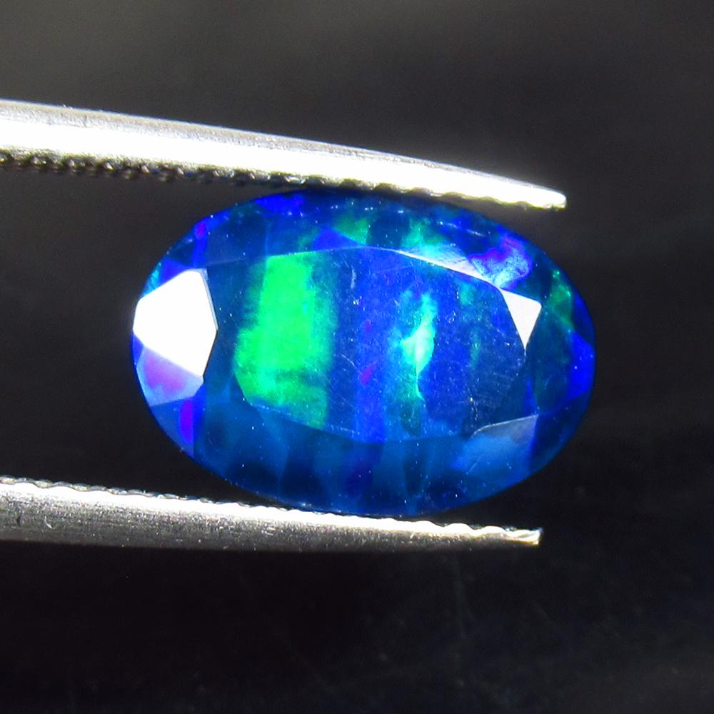 2.15 Ctw Natural Ethiopian Black Fire Opal Oval Cut: No Reserve! Title: 2.15 Ctw Natural Ethiopian Black Fire Opal Oval Cut Stone Clarity: Semi - Transparent Gemstones: Natural Black Opal Carat Weights: 2.15 Size/Dimensions: 11.20 x 7.90 x 6.10 mm Addit
