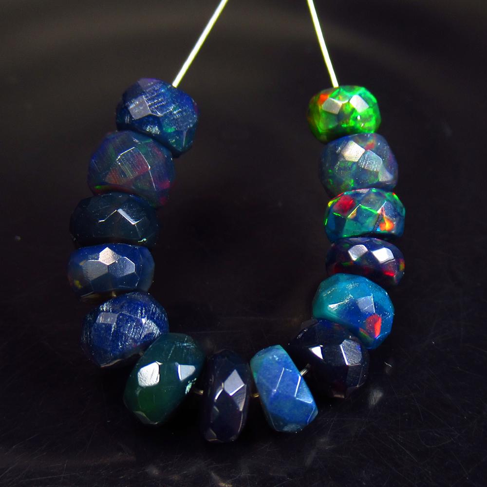 5.17 Ctw Natural 16 Drilled Faceted Black Opal Beads: No Reserve! Title: 5.17 Ctw Natural 16 Drilled Faceted Black Opal Beads Stone Clarity: Translucent Gemstones: Faceted Black Opal Beads Carat Weights: 5.17 Size/Dimensions: 4.60 to 5.10 mm / 16 PC's Ad