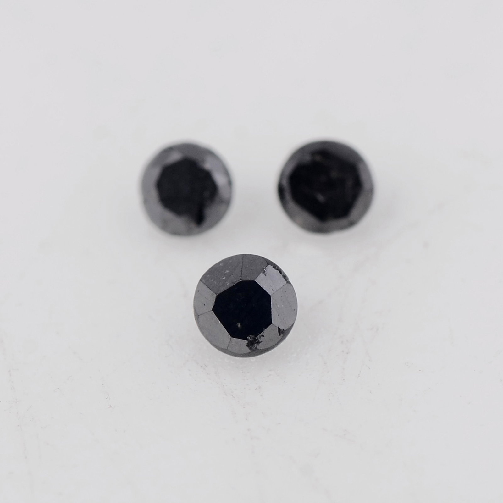 0.04 Carat Fancy Black Color Natural Round Diamond Loose Gemstone 3 Pieces: No Reserve! Title: 0.04 Carat Fancy Black Color Natural Round Diamond Loose Gemstone 3 Pieces Gemstones: Diamond Carat Weights: 0.039 Size/Dimensions: 1.5L x1.5W mm Shipping: Domestic: Flat-rate of $7