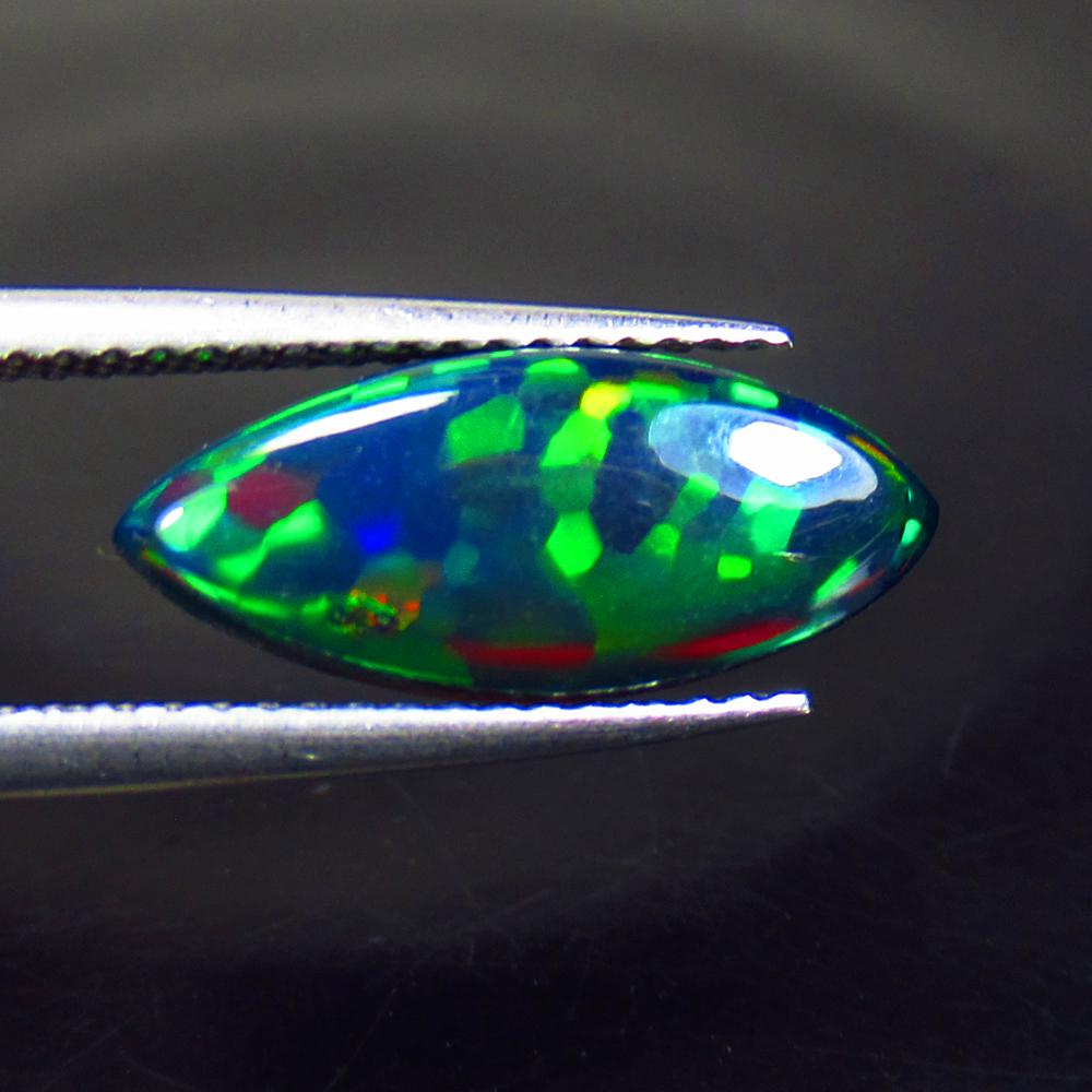 1.91 Ctw Natural Black Fire Opal Marquise Cab: No Reserve! Title: 1.91 Ctw Natural Black Fire Opal Marquise Cab Stone Clarity: Translucent Gemstones: Natural Opal Carat Weights: 1.91 Size/Dimensions: 15.90 x 6.80 x 4.00 mm Additional Information: 