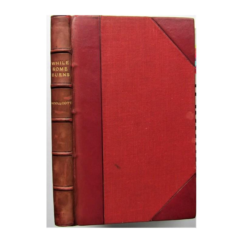 While Rome Burns: FIRST EDITION THUS. Half-leather over red cloth boards. Gilt title, raised bands to spine. Marbled endpapers. A scarce copy. Publisher: Penguin Books Ltd. London Author: alexander Woollcott Date Publi