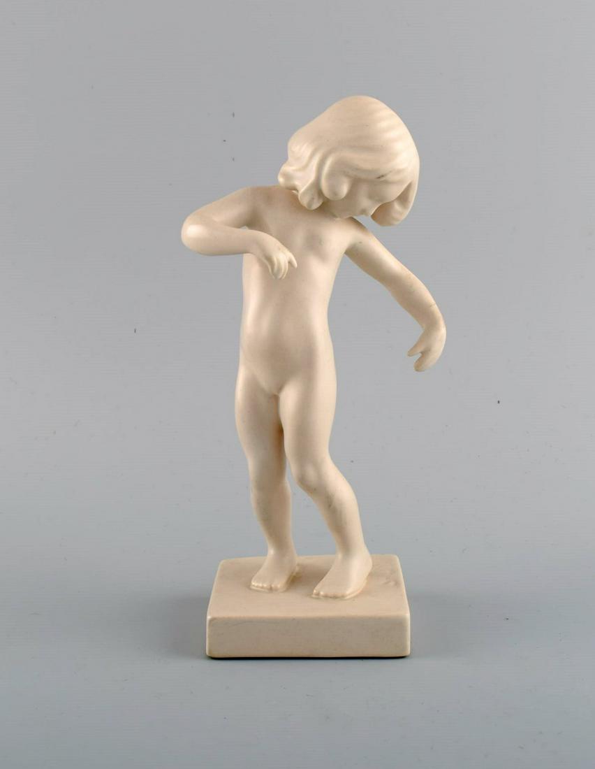 P. Ipsen's, Denmark. Girl no. 888. In rare white glaze. Venus Kalipygos, Design Kai Nielsen. 1940's. (1 of 9)