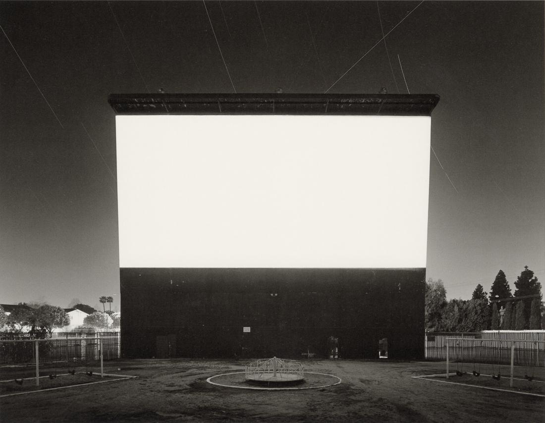 HIROSHI SUGIMOTO - Studio Drive-In, Culver City: Artist: Hiroshi Sugimoto Title: Studio Drive-In, Culver City, 1993 Medium: Photo Litho, 2005, Germany Dimensions: 8.45x6.6" Description: Heat Wax Mounted on 8.5x11" Conservation Board Artist Bio: Hiro