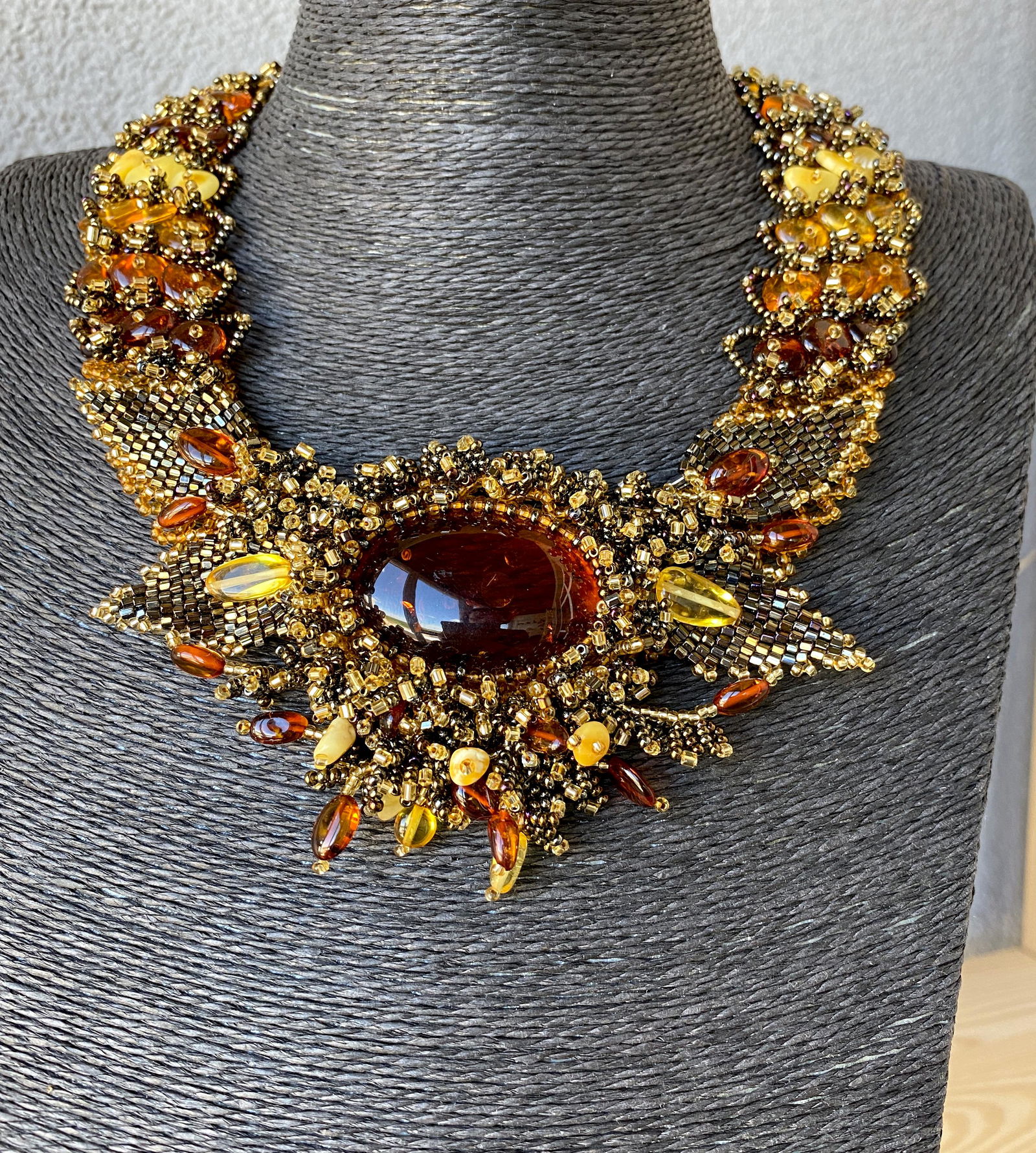 Staggering Amber Floral Necklace made from leaf like bead ornaments (1 of 9)