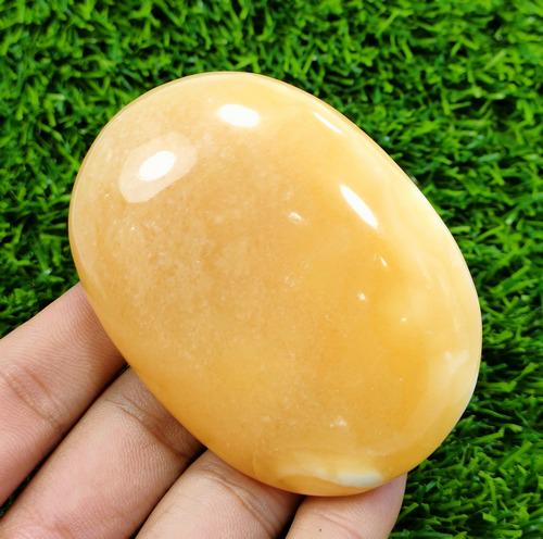 677 Carats Beautiful Natural Mango Calcite Healing Palm: Title: 677 Carats Beautiful Natural Mango Calcite Healing Palm Gemstone Type: Natural Carat Weights: 677 Carat Size/Dimensions: 73x53x19 mm Origin: Afghanistan Reserve: $30.00 Shipping: Domestic: Flat