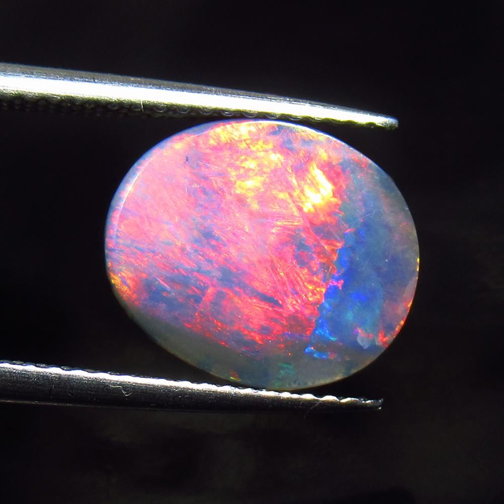 4.11 Ctw Natural Australian Doublet Opal Oval Cabochon: No Reserve! Title: 4.11 Ctw Natural Australian Doublet Opal Oval Cabochon Stone Clarity: Opaque Gemstones: Natural Australian Opal Carat Weights: 4.11 Size/Dimensions: 12.00 x 10.20 x 3.90 mm Addition