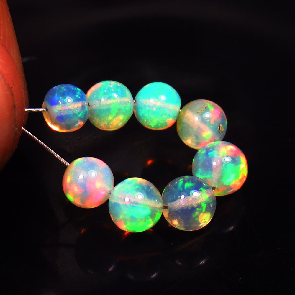 4.08 Ctw Natural 8 Drilled Fire Opal Ball Beads: No Reserve! Title: 4.08 Ctw Natural 8 Drilled Fire Opal Ball Beads Stone Clarity: Transparent Gemstones: Fire Opal Beads Carat Weights: 4.08 Size/Dimensions: 4.40 - 5.00 mm / 8 PC's Additional Informa