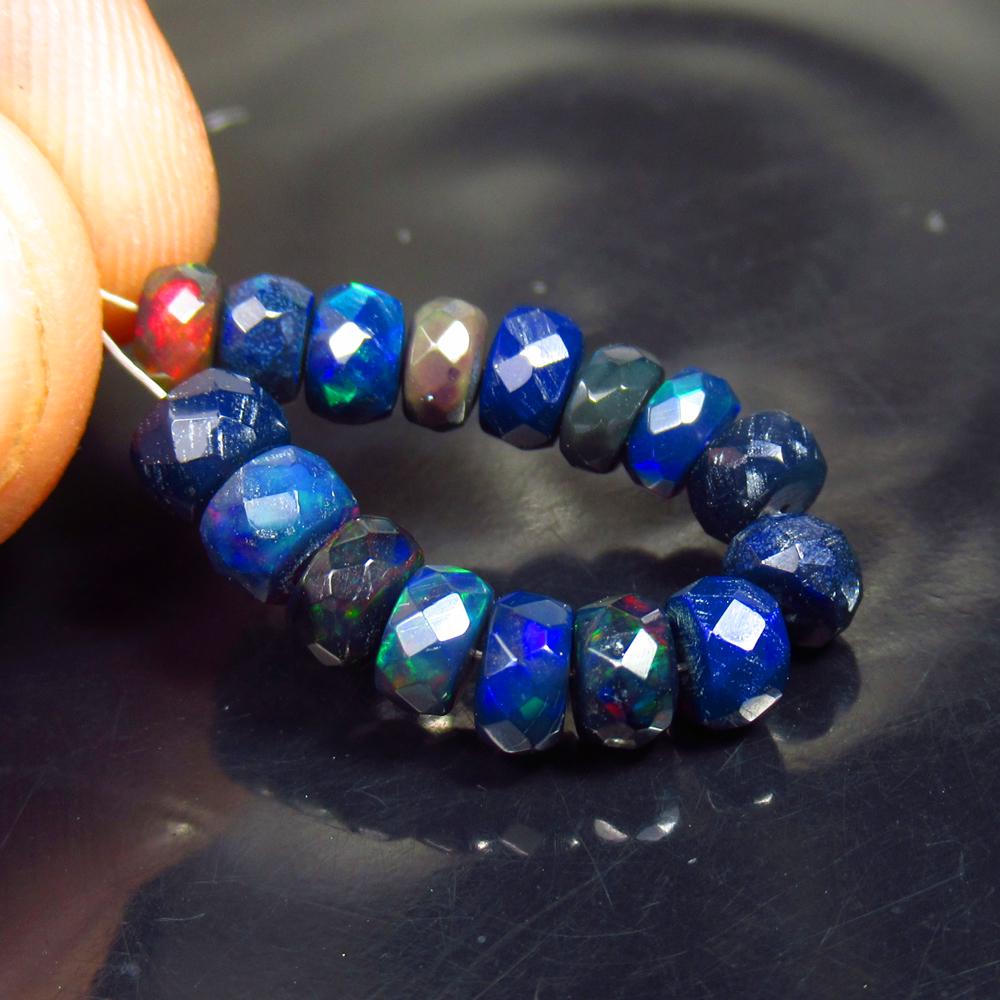 6.18 Ctw Natural 16 Drilled Faceted Black Opal Beads: No Reserve! Title: 6.18 Ctw Natural 16 Drilled Faceted Black Opal Beads Stone Clarity: Translucent Gemstones: Faceted Black Opal Beads Carat Weights: 5.18 Size/Dimensions: 4.50 to 5.10 mm / 16 PC's Ad