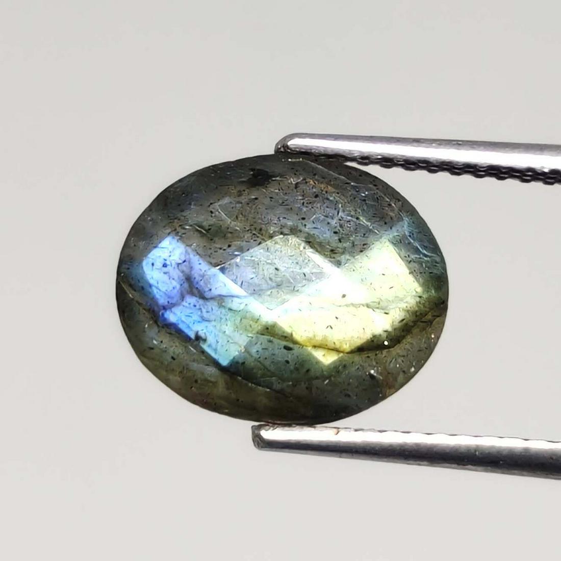 3.40 ct Natural Faceted Labradorite: No Reserve! Title: 3.40 ct Natural Faceted Labradorite Description: Gemstones: Labradorite Carat Weights: 3.40 ct Size/Dimensions: 11 X 9 mm Origin : Labrador Gemstone: Labradorite Weight Unit: Ct Qua