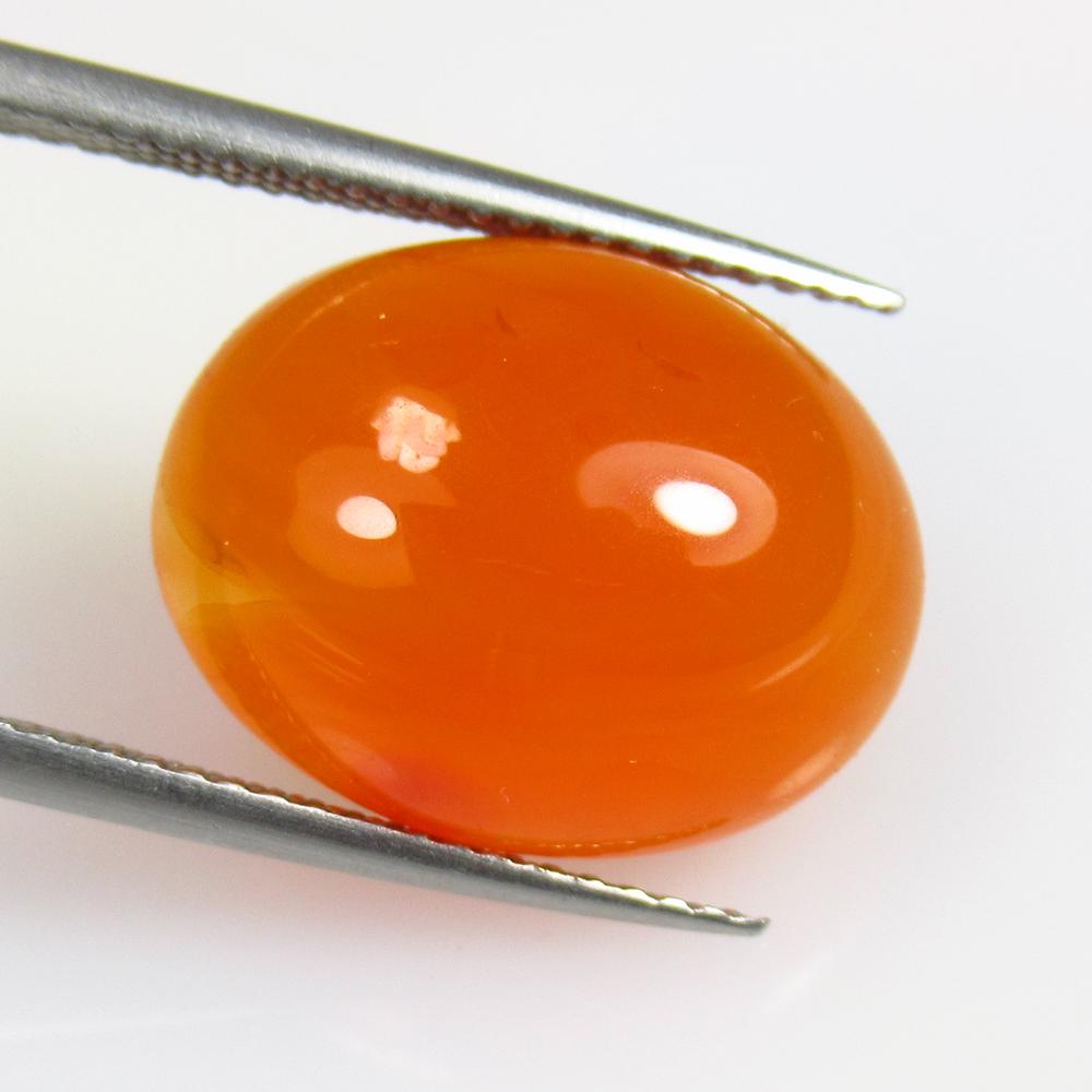 9.37 Ctw Natural Orange Carnelian Oval Cab: No Reserve! Title: 9.37 Ctw Natural Orange Carnelian Oval Cab Stone Clarity: Semi-Transparent Gemstones: Carnelian Carat Weights: 9.37 Size/Dimensions: 16.20 x 12.80 x 6.40 mm Additional Information: 