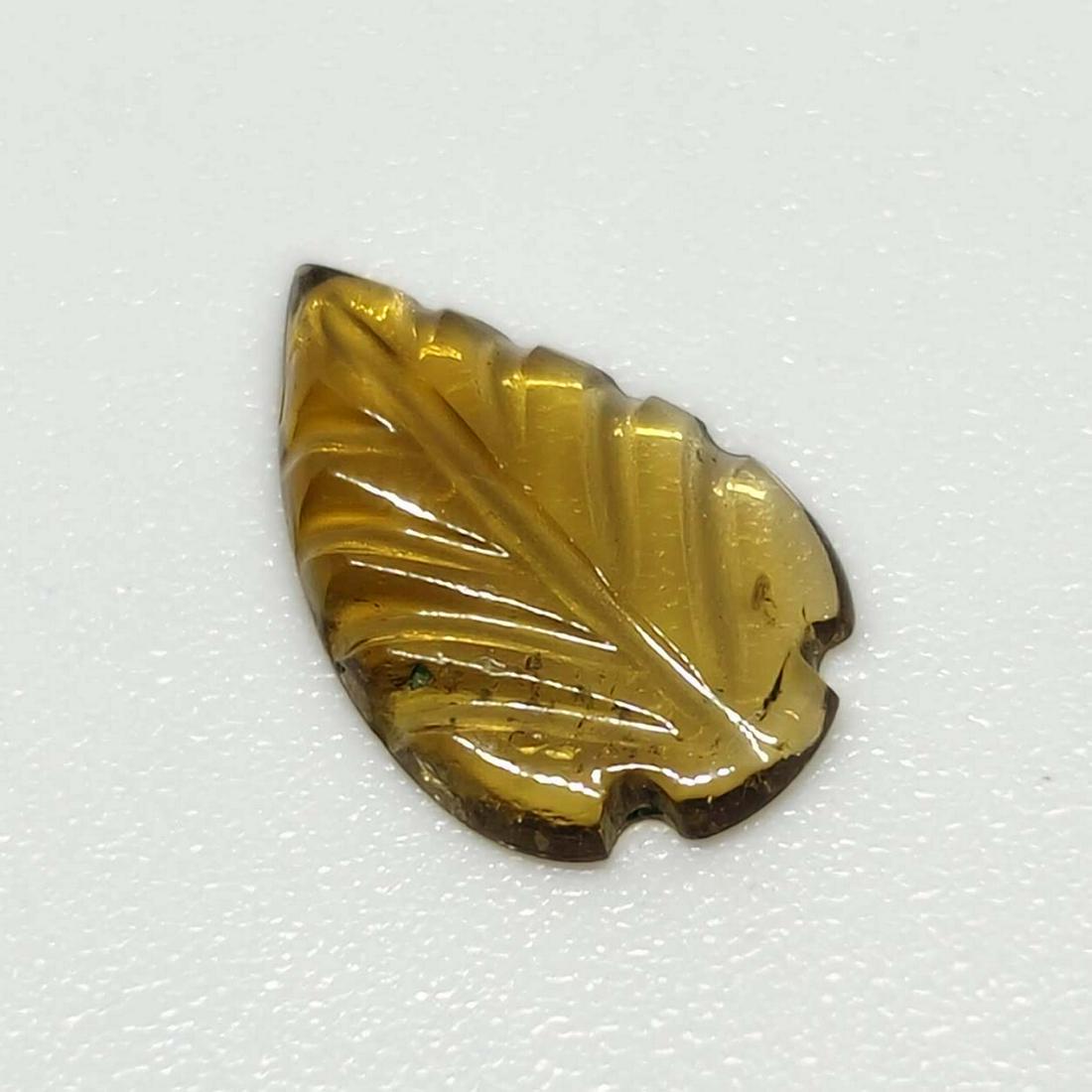 0.80 ct Natural Tourmaline Leaf Cut: No Reserve! Title: 0.80 ct Natural Tourmaline Leaf Cut Description: Gemstones: Tourmaline Carat Weights: 0.80 ct Size/Dimensions: 10 X 6 X 1.5 mm Gemstone: Tourmaline Weight Unit: Ct Quantity: 1 Sh