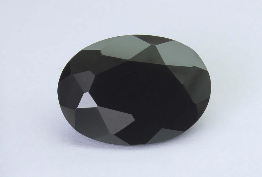 15.47 Cts Natural Black Spinel: No Reserve! Title: 15.47 Cts Natural Black Spinel Additional Information: Gemstone : Natural Black Spinel Shape and cut : Oval Cut Weight : 15.47 Carats Measurements : 18x13 mm Color : Black Transpran