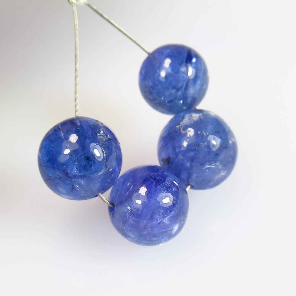 14.51 Ctw Natural 4 Drilled Tanzanite Round Ball Beads: No Reserve! Title: 14.51 Ctw Natural 4 Drilled Tanzanite Round Ball Beads Stone Clarity: Transparent Gemstones: Tanzanite Beads Carat Weights: 14.51 Size/Dimensions: 7.20 - 7.90 mm / 4 PC's Additional