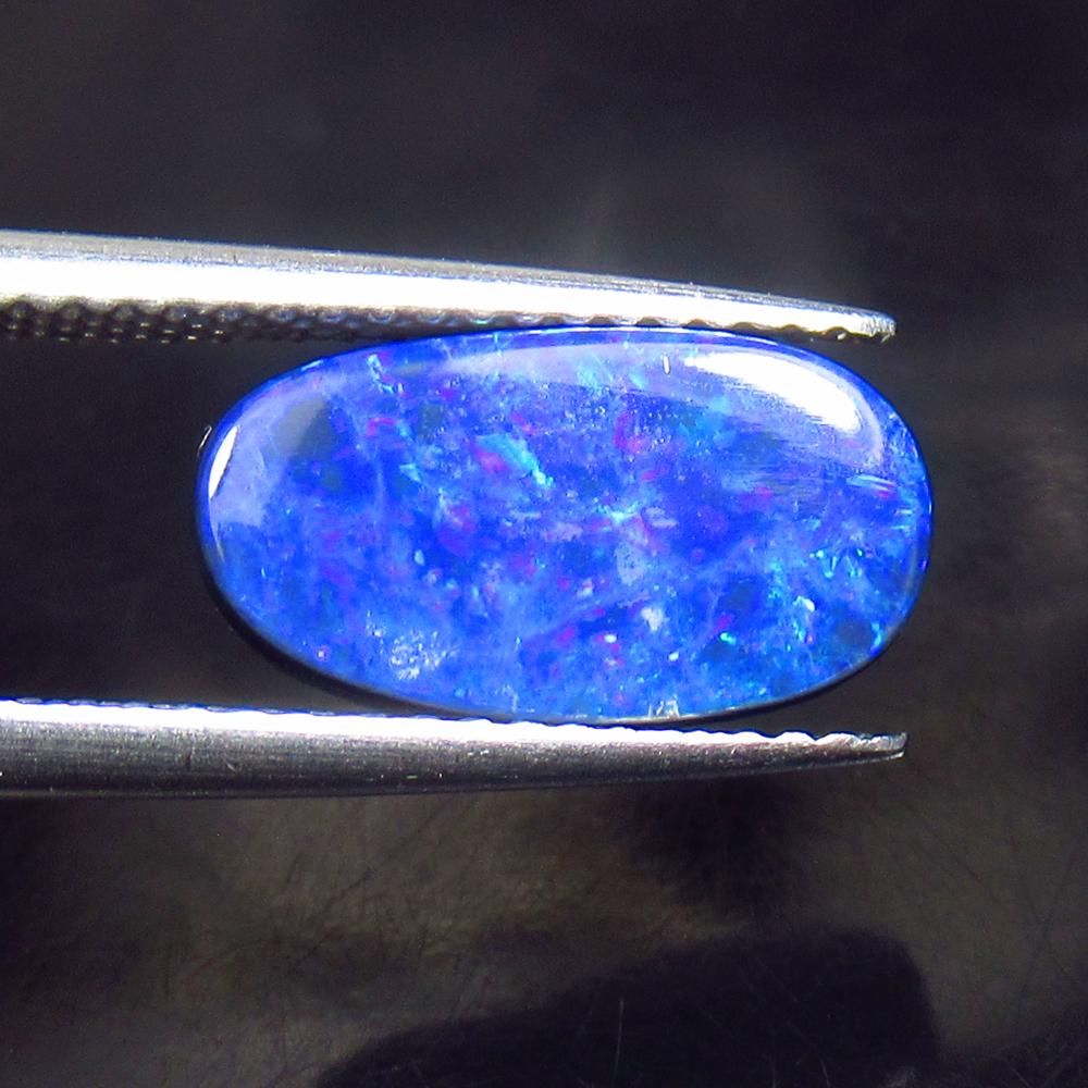 2.83 Ctw Natural Australian Doublet Opal Oval Cabochon: No Reserve! Title: 2.83 Ctw Natural Australian Doublet Opal Oval Cabochon Stone Clarity: Opaque Gemstones: Australian Duoblet Opal Carat Weights: 2.83 Size/Dimensions: 12.70 x 7.00 x 4.00 mm Additiona