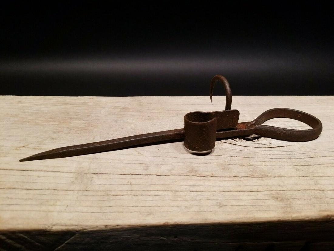 Wrought Iron Mining Sticking Tommy Miners Candlestick: 10 1/2" Long Nice Reproduction iron miners candle holder. Great handmade distressed to look like an antique.... Miner spikes like this were used in the mining trade & era. The spike would be hammered 