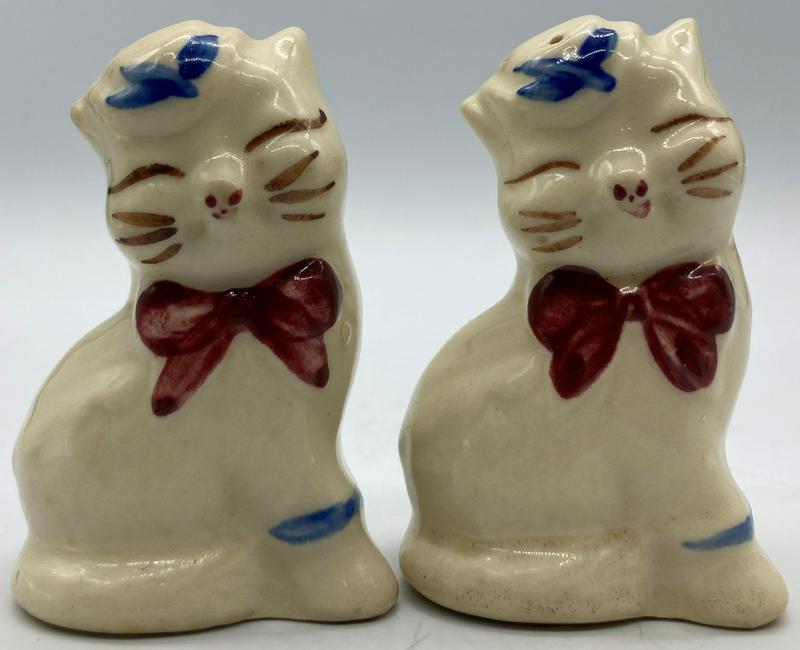 SHAWNEE PUSS N' BOOTS SALT AND PEPPER: Title: SHAWNEE PUSS N' BOOTS SALT AND PEPPER Date/Period: Dimension: Approx 3.25" tall x 2.25" x 1.75" Materials: Additional Information: SHAWNEE PUSS N' BOOTS SALT AND PEPPER Shipping: Domestic: Flat