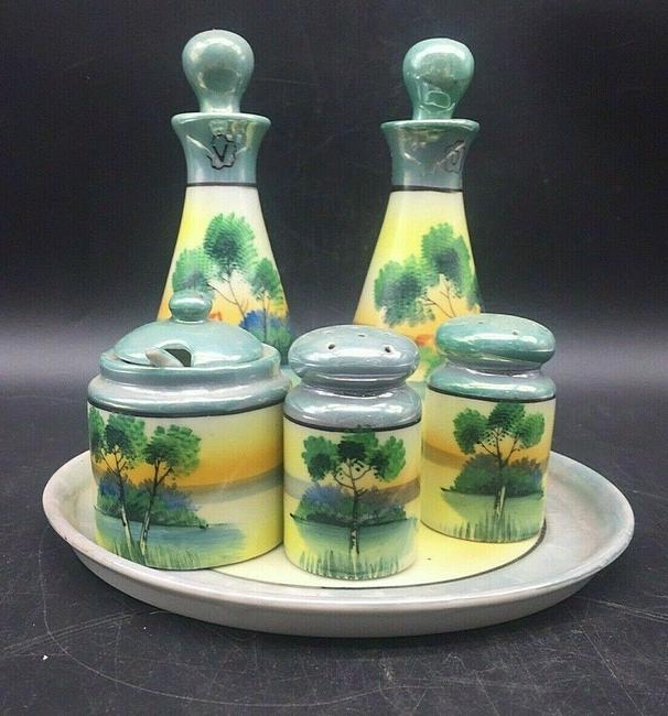 Vintage Lustreware Condiment Set Japan: Title: Vintage Lustreware Condiment Set Japan Date/Period: approx early to mid 1900's Dimension: various sizes Materials: ceramic Additional Information: Vintage Lustreware Salt Pepper Oil Vinegar Mus