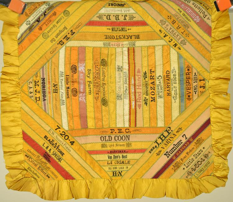 Cigar Silk Premium Pillow Cover dated "1904": Vibrant silk and cotton cigar silk premium pillow cover, with a two inch gold ruffle and unusual red cigar silks. "1904" is penciled in the center. It measures 26" X 26" including the ruffle, and is i
