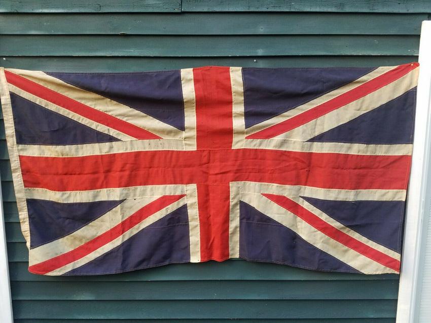 1890's wool British flag union jack Sewn has name on field: Been dealing with fabrics for over 25 years and I believe this dates 1890-1910 period. Machine sewn. Name that I can't make out on the hoist. Coarse wool. Small moth holes throughout. Approximately 3 