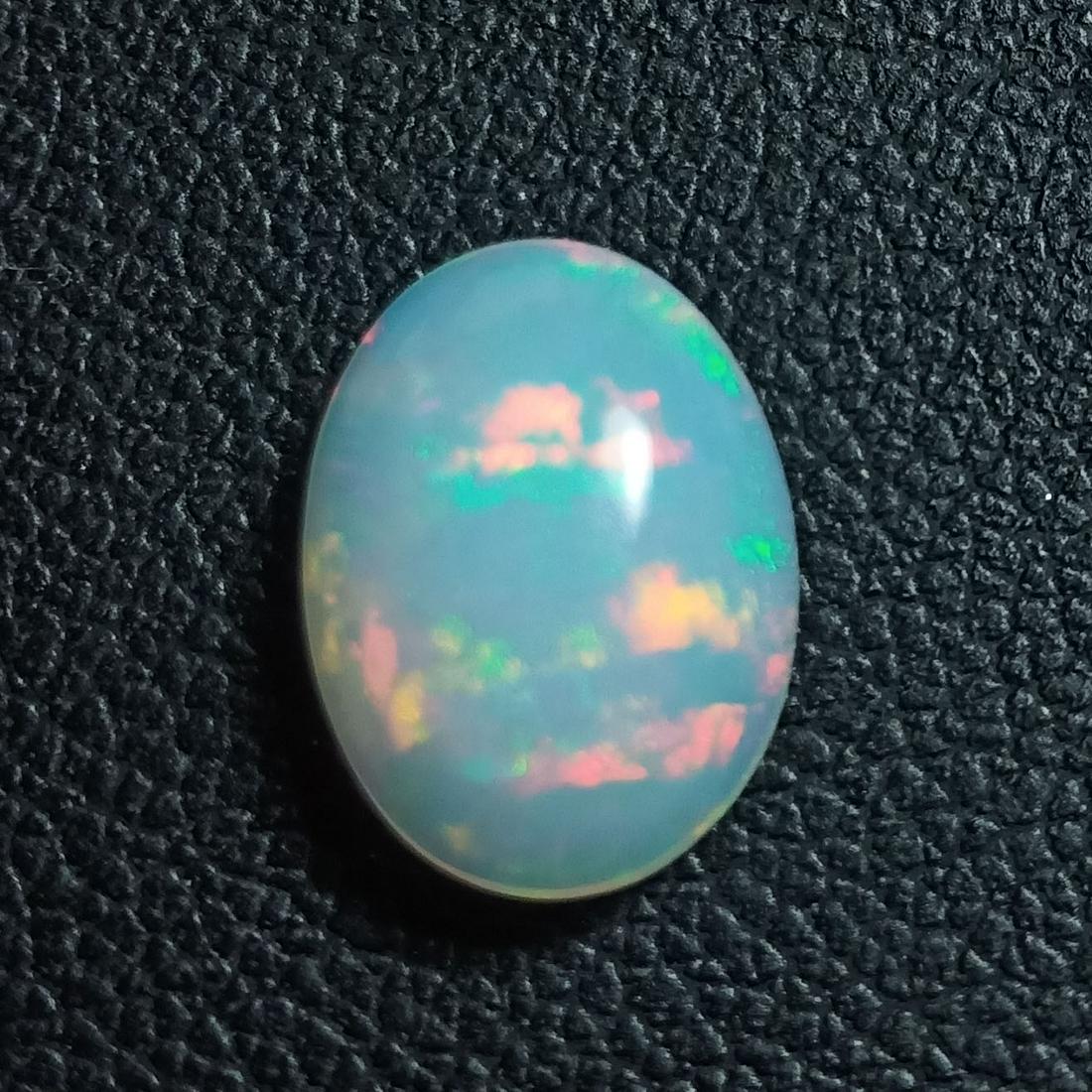 2.05 ct RARE! GOOD LUSTER FLASHING 100%NATURAL MULTI COLOR OPAL OVAL SHAPE (1 of 6)