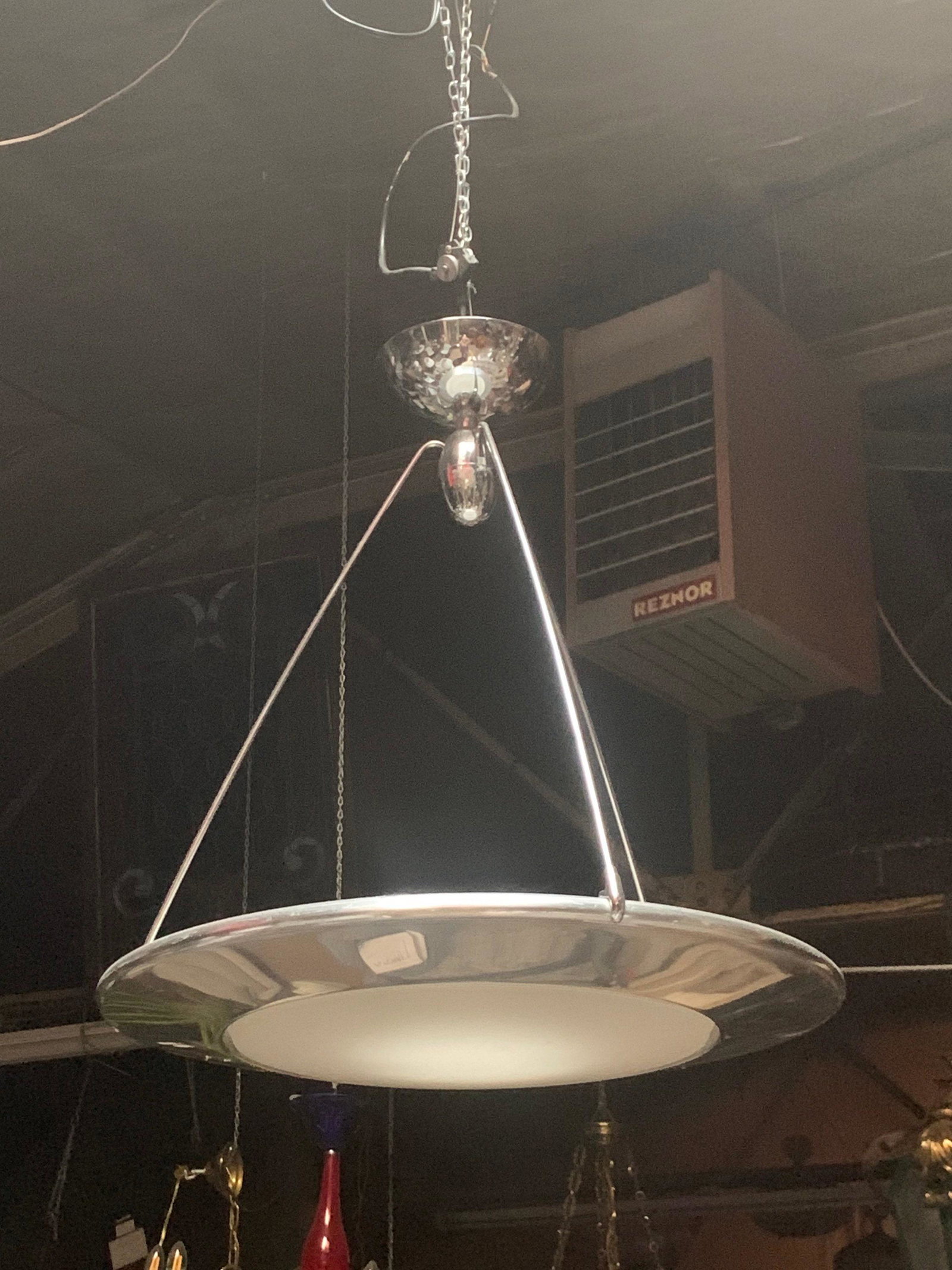 Vintage Atomic Space Chrome Disk Lamp Mira S Hanging Lamp by Ezio Didone for Arteluce: Vintage from the 1990s Materials: Metal Height: 25 inches Width: 24 inches Depth: 24 inches Description Vintage Atomic Space Chrome Disk Lamp Mira S Hanging Lamp by Ezio Didone for Arteluce Vintage Po