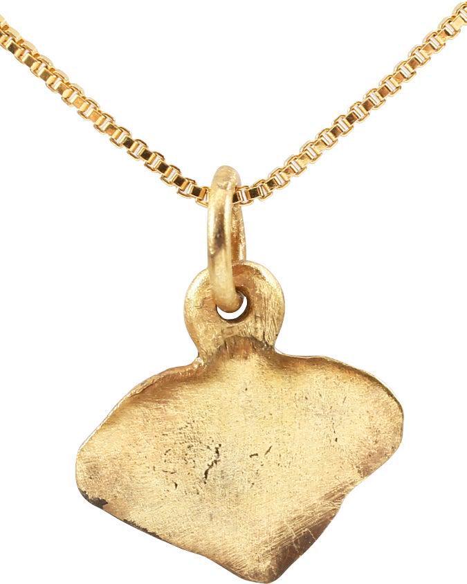 VIKING HEART PENDANT NECKLACE, C. 1000 AD: A good example of a particularly intricate form. Broad heart in its naturalistic (uncusped) form. The center and edges slightly thickened and the bottom edge slightly indented in the thinned areas. Th