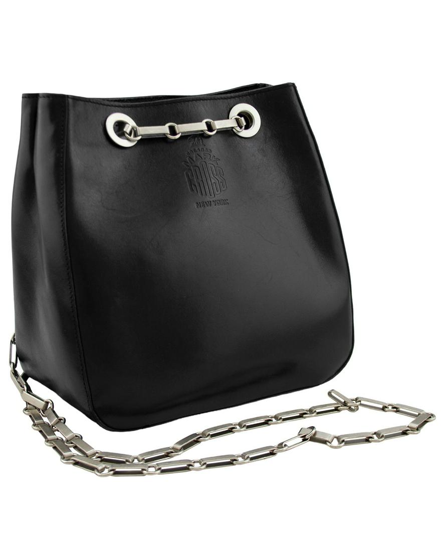 Mark Cross Black Leather Small Bucket Bag: Mark Cross 1990’s black leather small bucket bag with silver flat link double chain handles. Can be worn with the chains doubled on one shoulder or single cross body. Black semi polished leather