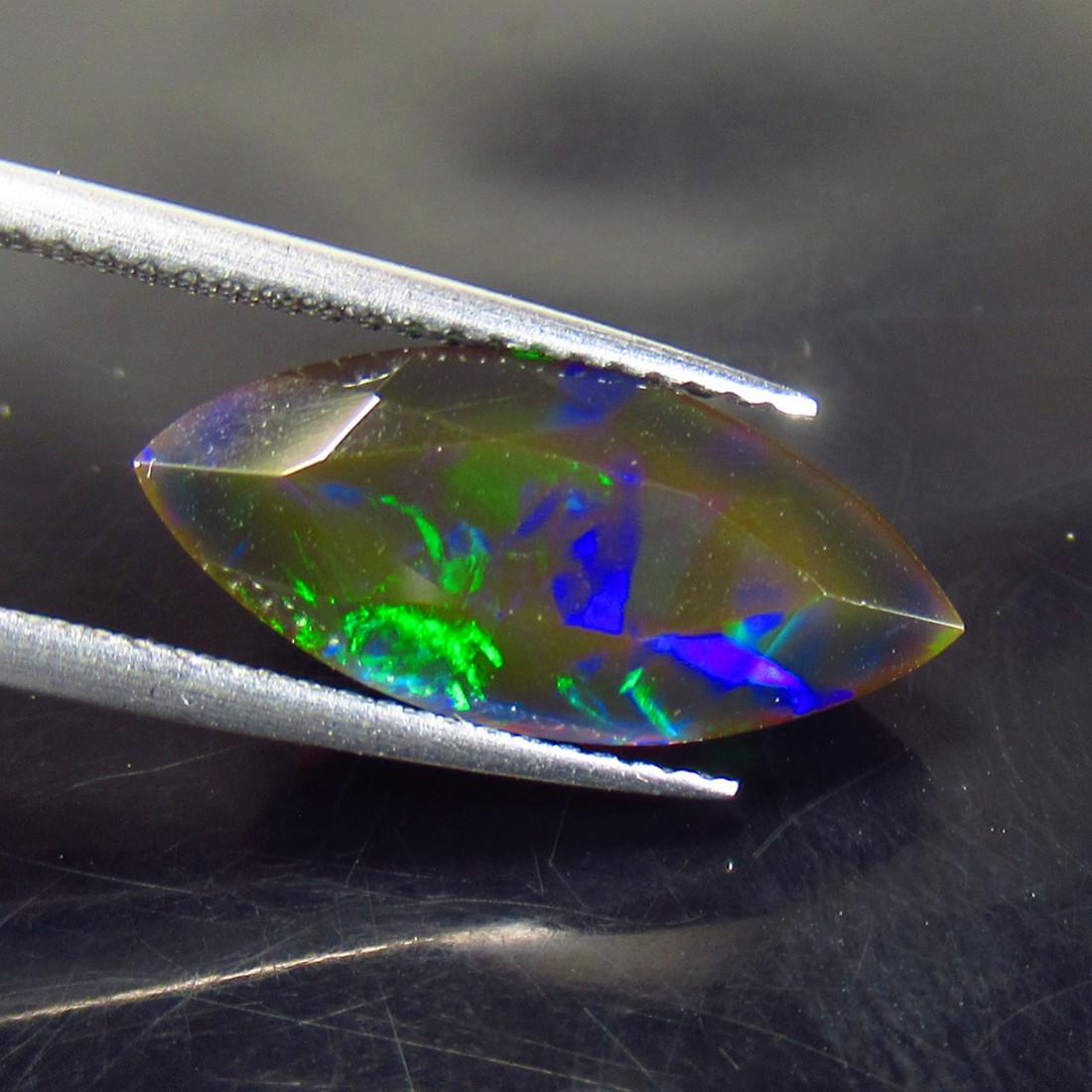 4.30 Ctw Natural Ethiopian Black Fire Opal Marquise Cut: No Reserve! Title: 4.30 Ctw Natural Ethiopian Black Fire Opal Marquise Cut Stone Clarity: Translucent Gemstone: Natural Black Opal Carat/Weights: 4.3 Size/Dimension: 17.90 x 7.90 x 7.90 mm Additional 