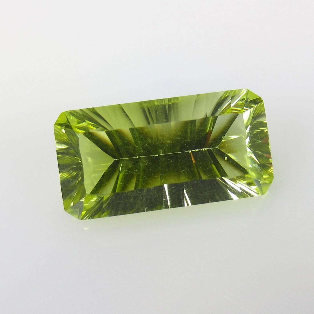 9.40 Ctw Natural Lemon Quartz Concave Cut: No Reserve! Title: 9.40 Ctw Natural Lemon Quartz Concave Cut Stone Clarity: VVS Gemstone: Natural Lemon Quartz Carat/Weights: 9.4 Size/Dimension: 18.50 x 9.50 x 7.50 mm Additional Information: Top Cla