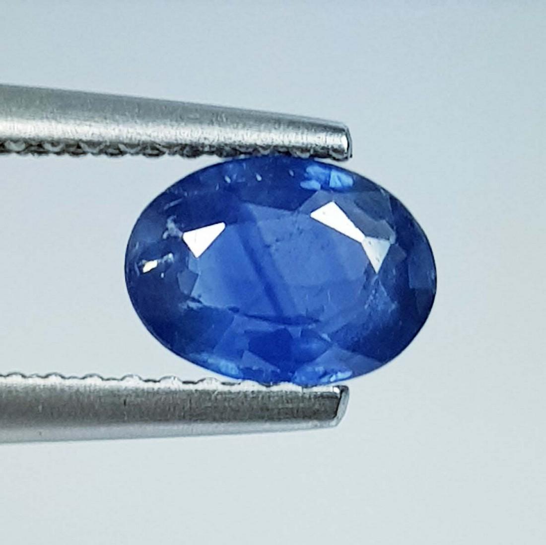 0.88 ct Natural Blue Sapphire: No Reserve! Title: 0.88 ct Natural Blue Sapphire Color/Clarity: Blue / VS Gemstones: Loose Gemstones Carat Weights: 0.88 Size/Dimensions: 7.00 x 5.20 x 2.15 Additional Information: Oval - Burma Shippi
