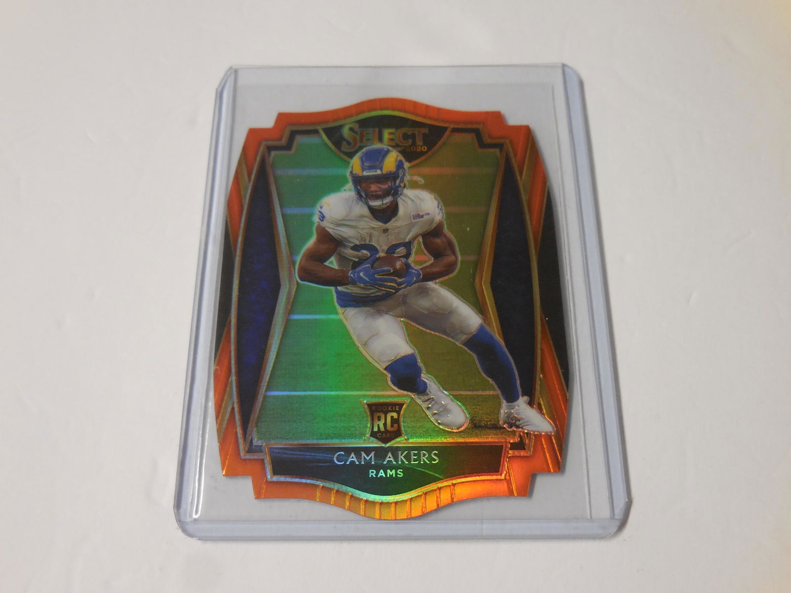 20 SELECT CAM AKERS ORANGE DIE CUT RC (1 of 2)