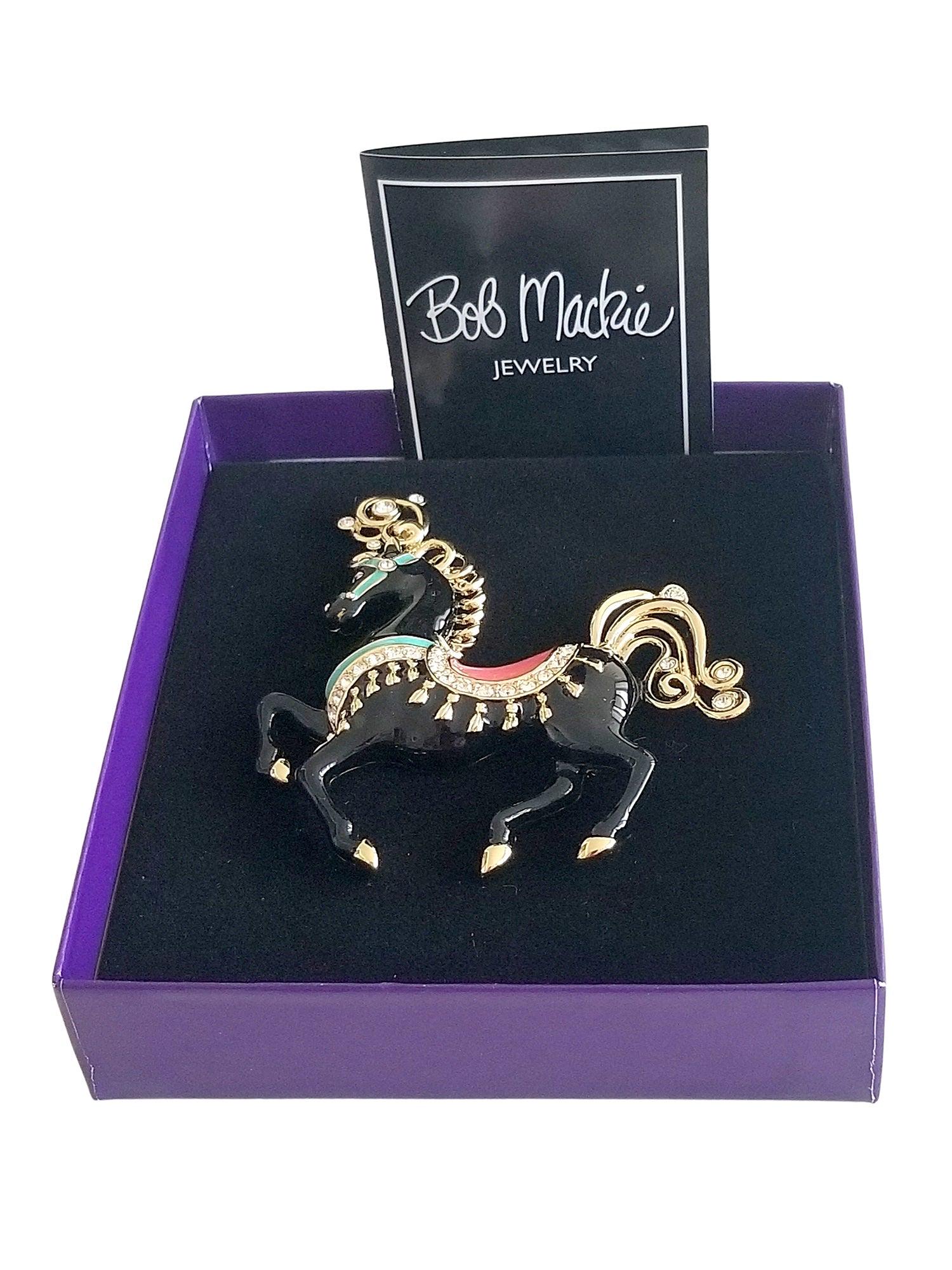 Rare Bob Mackie Carousel Horse Brooch Lapel Pin Black Enamel Original Box: Vintage and Rare Bob Mackie Carousel Horse Brooch with Original Box We offer this stunning brooch of a carousel horse, designed by Bob Mackie. Place this lovely collector pin on your lapel, hat, handb