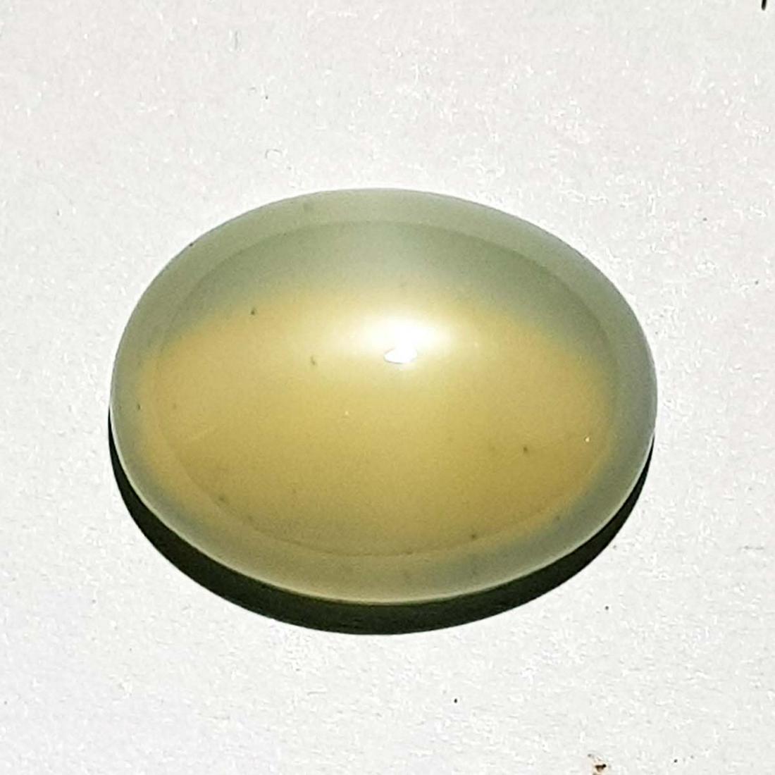 19.63 ct Natural Moonstone: No Reserve! Title: 19.63 ct Natural Moonstone Color/Clarity: Grey / Transprent Gemstone: Moonstone Carat Weight: 19.63 Size/Dimensions: 20.30 x 15.70 x 9.00 Additional Information: Oval / India Shippi
