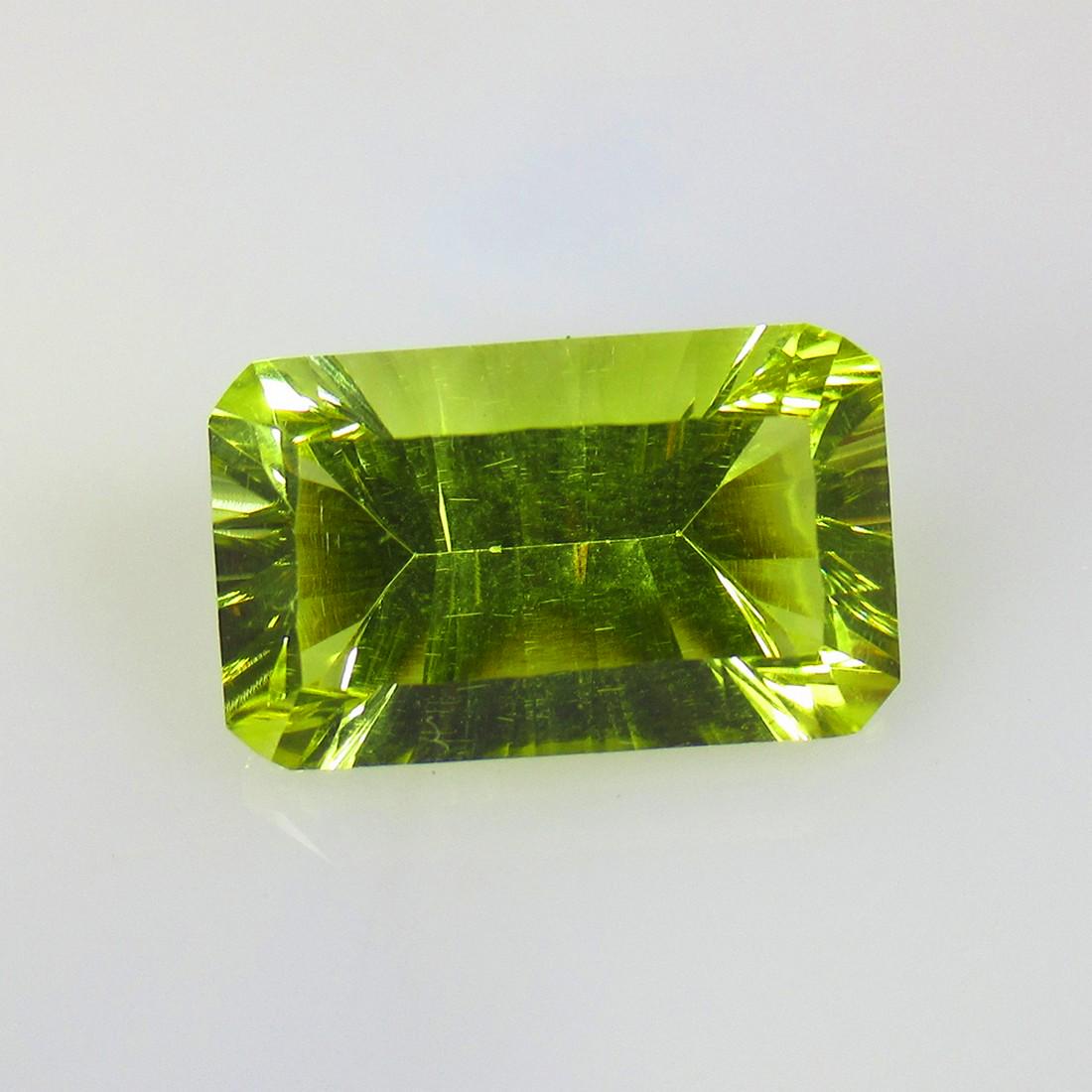 8.77 Ctw Natural Lemon Quartz Concave Cut: No Reserve! Title: 8.77 Ctw Natural Lemon Quartz Concave Cut Stone Clarity: VVS Gemstone: Natural Lemon Quartz Carat Weights: 8.77 Size/Dimensions: 16.30 x 10.00 x 7.50 mm Additional Info: Good Luster