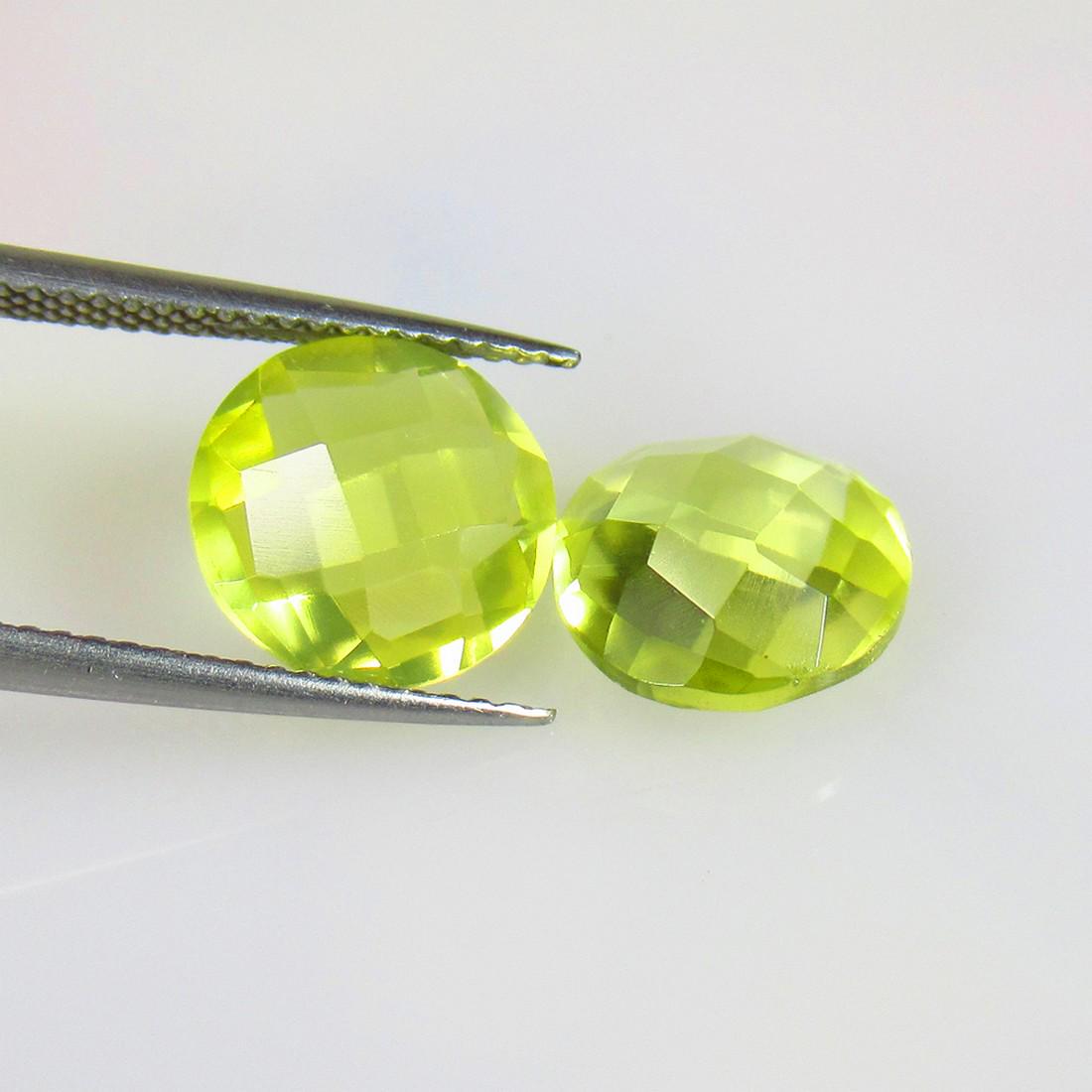 6.06 Ctw Natural Lemon Quartz Round Checkerboard Pair: No Reserve! Title: 6.06 Ctw Natural Lemon Quartz Round Checkerboard Pair Stone Clarity: VVS Gemstone: Natural Lemon Quartz Carat Weights: 6.06 Size/Dimensions: 10.10 x 10.10 x 5.00 mm / 2 Pc's Additio