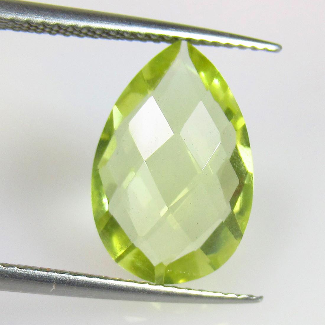 4.50 Ctw Natural Lemon Quartz Pear Checkerboard Cut: No Reserve! Title: 4.50 Ctw Natural Lemon Quartz Pear Checkerboard Cut Stone Clarity: VVS Gemstone: Natural Lemon Quartz Carat Weights: 4.50 Size/Dimensions: 15.10 x 10.10 x 5.20 mm Additional Info: G