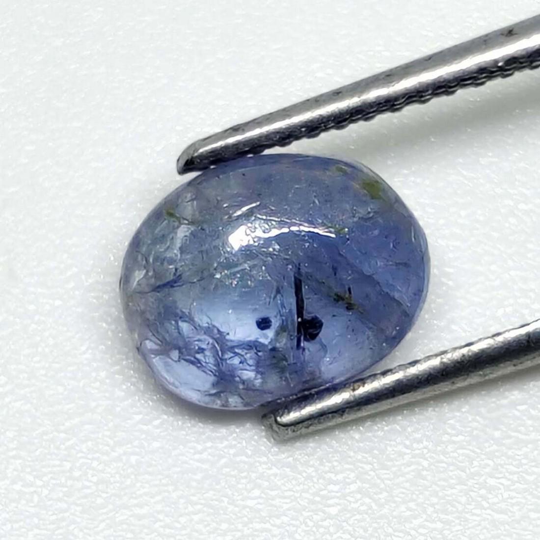1.80 ct Natural Tanzanite Cab: No Reserve! Title: 1.80 ct Natural Tanzanite Cab Additional Information: Gemstones: Tanzanite Carat Weights: 1.80 ct Size/Dimensions: 8.5 X 6.8 X 3 mm Materials & Techniques: Tanzanite Weight Unit: Ct