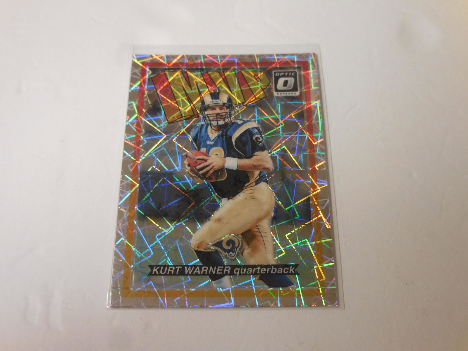 2018 OPTIC KURT WARNER MVP PRIZM SP: 2018 PANINI DONRUSS OPTIC KURT WARNER MVP PRIZM SP ST LOUIS RAMS THIS IS A WONDERFUL CARD FOR ANY COLLECTOR. THIS CARD COMES WITH SLEEVE AND TOP LOADER. PLEASE CHECK PHOTOS TO HELP DETERMINE THE CONDI