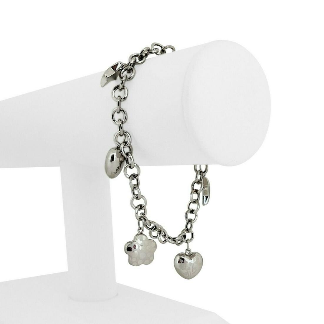 18k White Gold 10.3g Ladies Heart and Star Charm Link Bracelet Italy 7.5": Condition: Excellent Condition, Professionally Cleaned and Polished Metal: 18k Gold (Marked, and Professionally Tested) Weight: 10.3g Length: 7.5 Inches Width: 6mm Closure: Lobster Claw Markings: "750