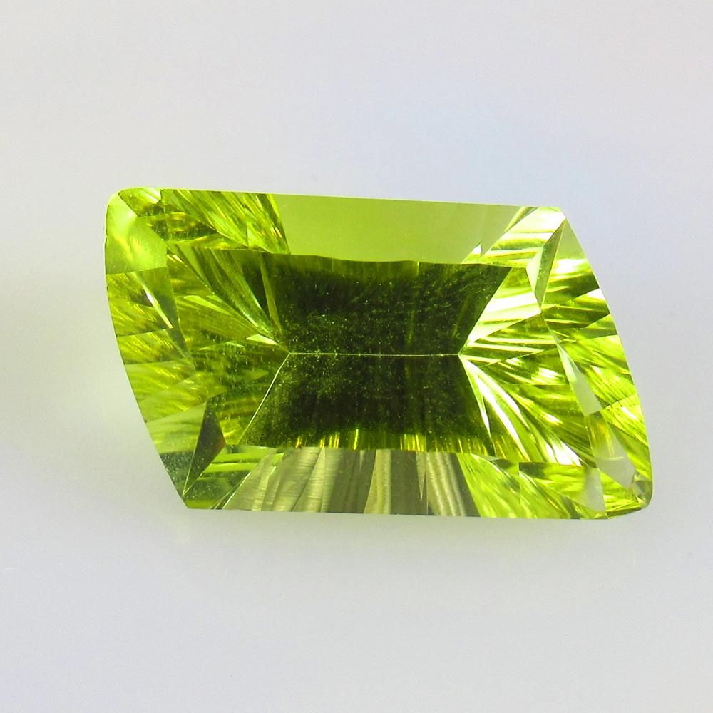10.55 Ctw Natural Lemon Quartz Fancy Concave Cut: No Reserve! Title: 10.55 Ctw Natural Lemon Quartz Fancy Concave Cut Stone Clarity: VVS Gemstones: Natural Lemon Quartz Carat Weights: 10.55 Size/Dimensions: 20.20 x 10.40 x 8.70 mm Additional Informat