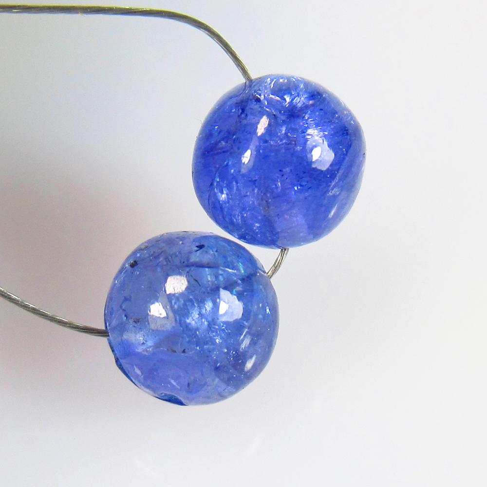 5.15 Ctw Natural 2 Drilled Tanzanite Round Ball Beads: No Reserve! Title: 5.15 Ctw Natural 2 Drilled Tanzanite Round Ball Beads Stone Clarity: Transparent Gemstones: Tanzanite Beads Carat Weights: 5.15 Size/Dimensions: 6.50 - 6.70 mm / 2 PC's Additional I
