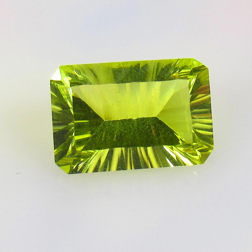 7.75 Ctw Natural Lemon Quartz Concave Cut: No Reserve! Title: 7.75 Ctw Natural Lemon Quartz Concave Cut Stone Clarity: VVS Gemstones: Natural Lemon Quartz Carat Weights: 7.75 Size/Dimensions: 15.00 x 10.20 x 7.50 mm Additional Information: Top